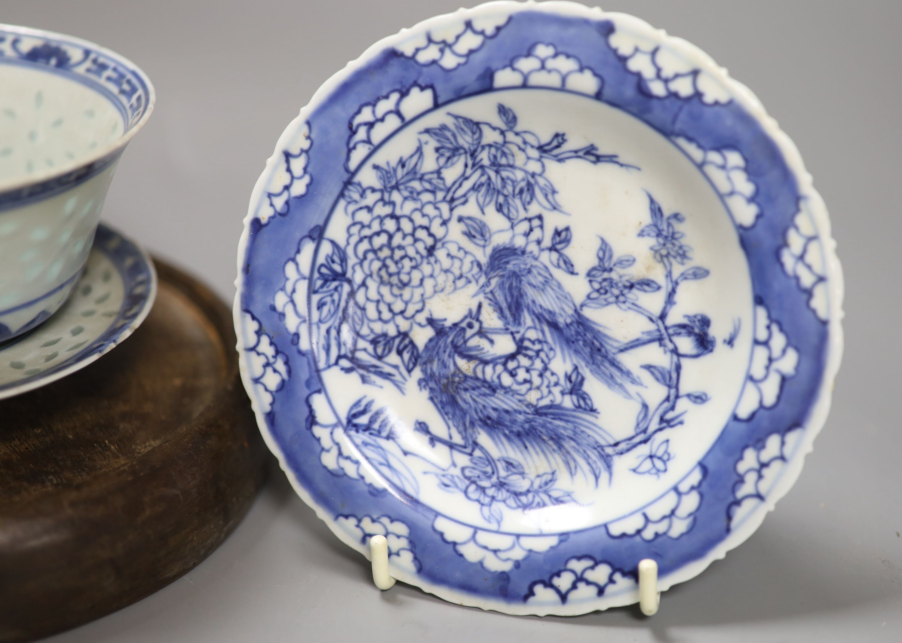 A group of Chinese blue and white wares, including a Chinese blue and white dish, a similar pedestal dish and a tea bowl and saucer, to